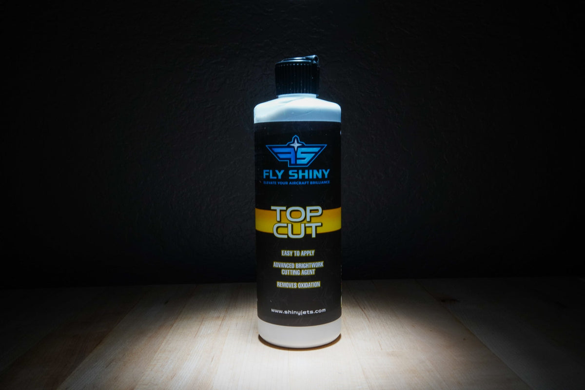 Fly Shiny Top Cut – Heavy-cut metal polish engineered for aviation brightwork, removing oxidation, scratches, and imperfections to restore a brilliant, mirror-like finish.