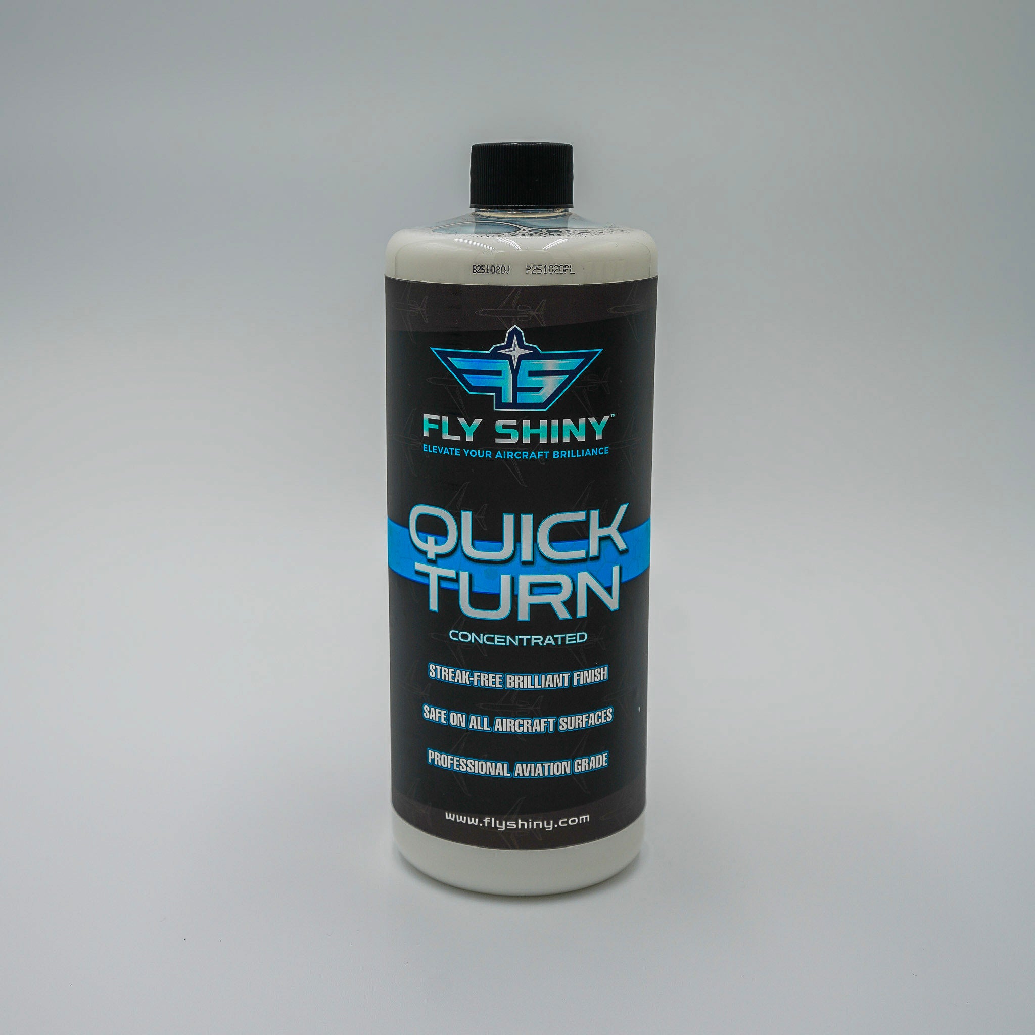Fly Shiny Quick Turn 32 oz Concentrated Aircraft Dry Wash bottle on a gray background, professional aviation-grade waterless cleaner that dilutes to 80 gallons.